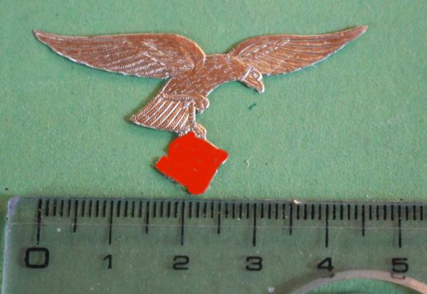 small Luftwaffe eagle with HK stick on ??