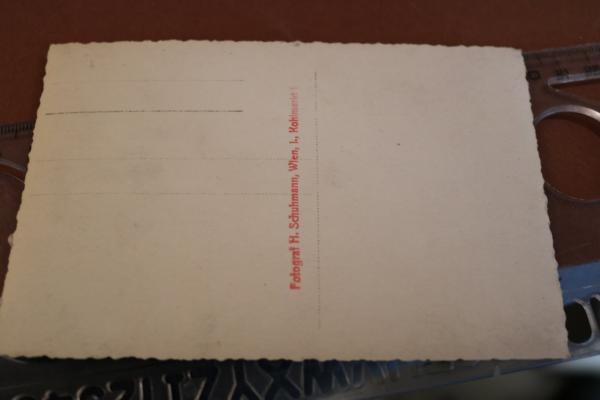 Photo - A. Hitler is hugged by a little girl - Vienna