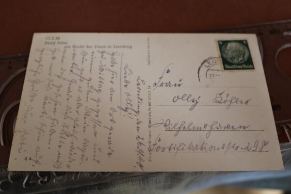 Postcard - 13.3.1938 Adolf Hitler at the grave of his parents in Leonding